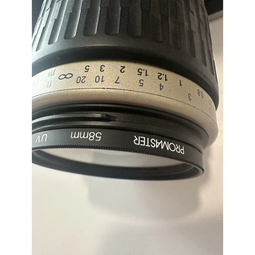 Pentax ZX-7 35mm film camera with promaster 58MM & Case UNTESTED